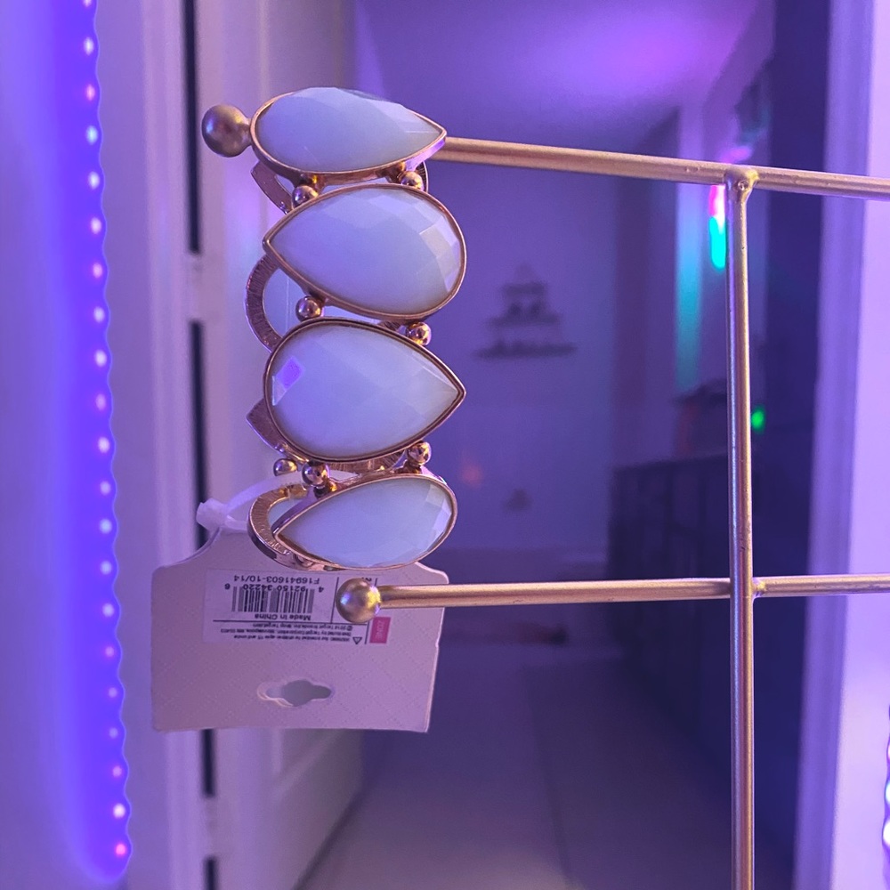 Tear dropped shaped aqua bracelet with gold trim, new with tags, never worn